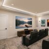 Home Theater Installation displaying 1/4 Round Cove Crown Molding for Lighting with Miami Art Deco baseboard and Casing