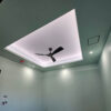 Installed San Jose Molding for Indirect Lighting creating a recessed ceiling detail with soft perimeter illumination in a modern interior.