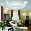 Installed Cathedral & Vaulted Ceiling Molding for Indirect Lighting creating a recessed ceiling design with soft illumination in an elegant traditional living room.