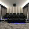 Installed Cincinnati 3-Step Molding for Indirect Lighting creating soft perimeter ceiling illumination in a modern home theater.