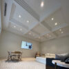 Installed Cincinnati 3-Step Molding for Indirect Lighting creating a layered coffered ceiling effect in a refined contemporary interior.