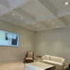 Installed Cincinnati 3-Step Molding for Indirect Lighting creating a layered coffered ceiling effect in a refined contemporary interior.