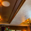 Installed Miami 2-Way Molding for Indirect Lighting creating concealed ceiling illumination in a richly finished interior.