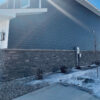 Volcano Ash Stacked Stone Panel Installed on a Town House