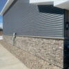 Volcano Ash Stacked Stone Panel Installed on a Town House