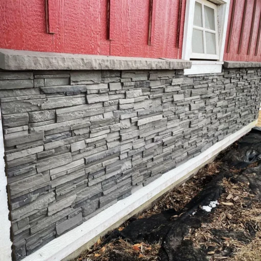 Volcano Ash Stacked Stone Panel Installation on a red house