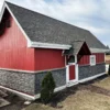 Volcano Ash Stacked Stone Panel Installation on a red house