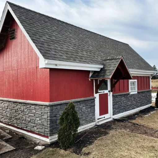 Volcano Ash Stacked Stone Panel Installation on a red house