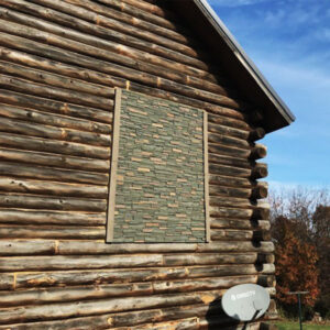 Yosemite Hike Stacked Stone Panel Installed on a log cabin