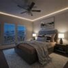 Contemporary bedroom at night featuring Asheville Molding for Indirect Lighting (Tall) with concealed perimeter LED lighting, installed with Miami Art-Deco Baseboard (Extra Tall), alongside a wood bed frame, matching nightstands, table lamps, and large windows.